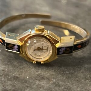 Gold tone and Black Elegant Watch  Swiss made 17 jewels mechanical,